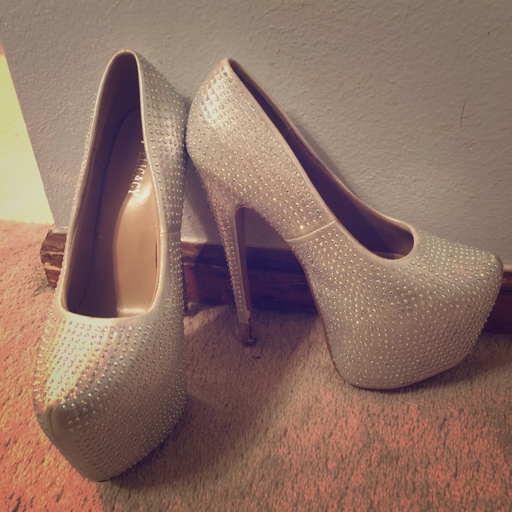 Delicacy sexy silver rhinestone very high heels.